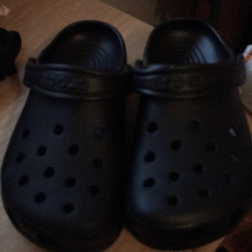 Black Crocs with Tags size 7 Women and 5 Men. Brand new.